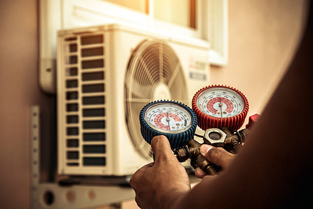 Professional Hvac Maintenance technician working in Leawood, KS